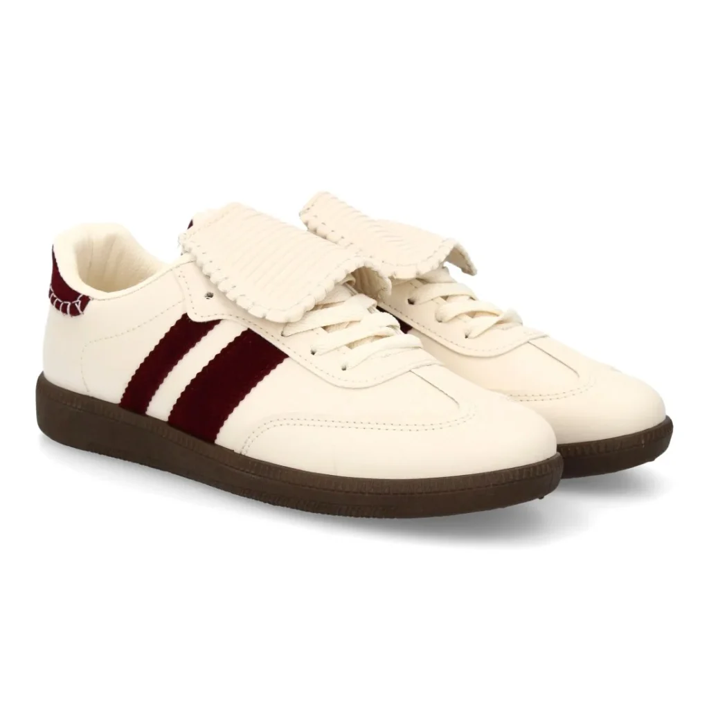 Zapatilla moderna con detalle en lengüeta para mujer
